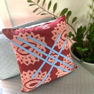 Red and Pink Patterned Throw Pillow
